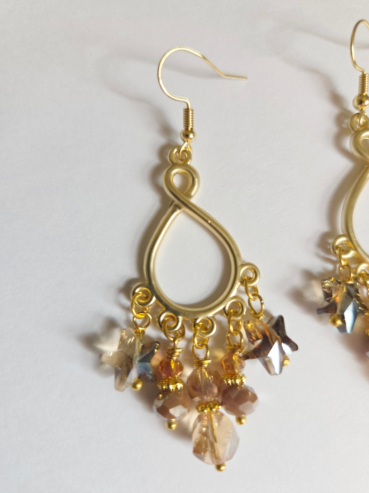 Gold teardrop chandelier star statement earrings