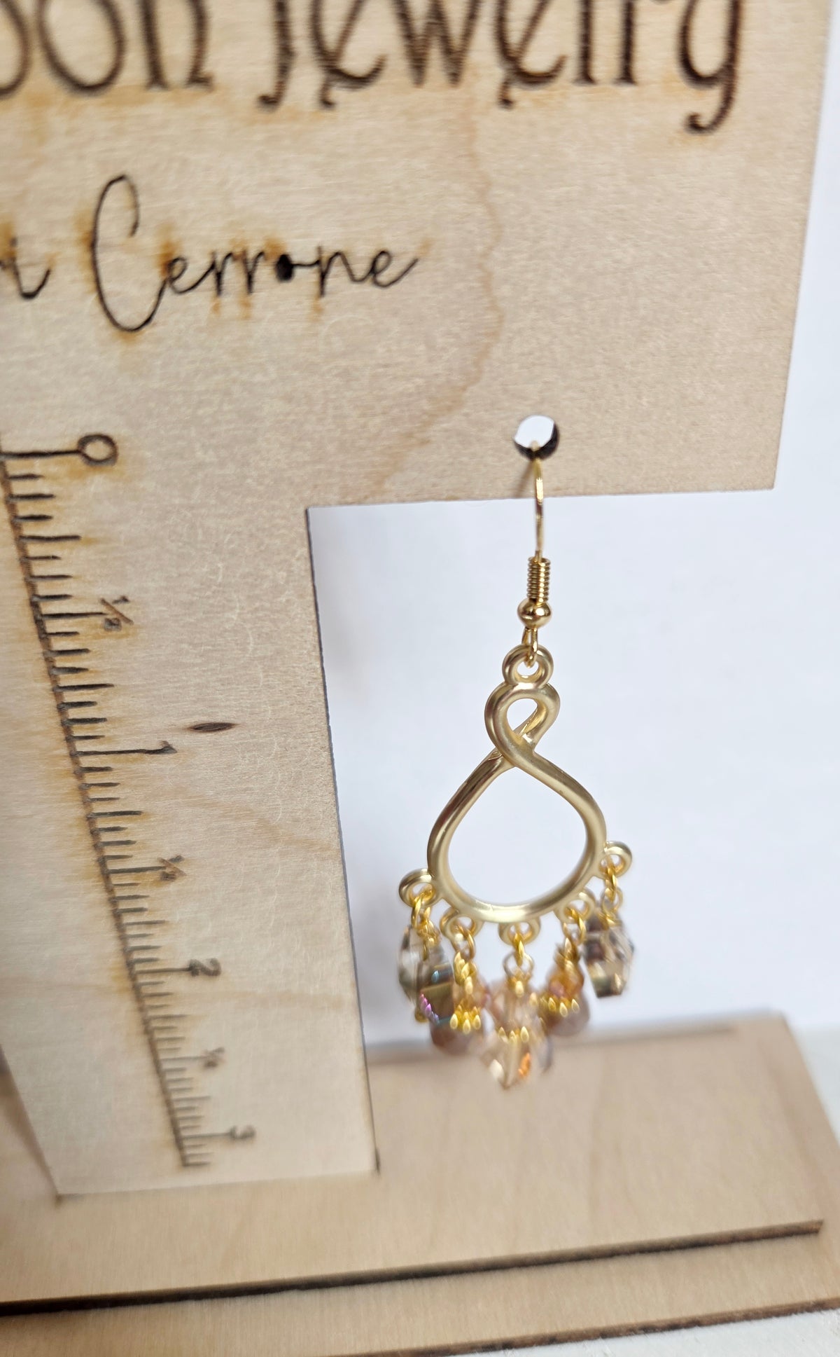 Gold teardrop chandelier star statement earrings