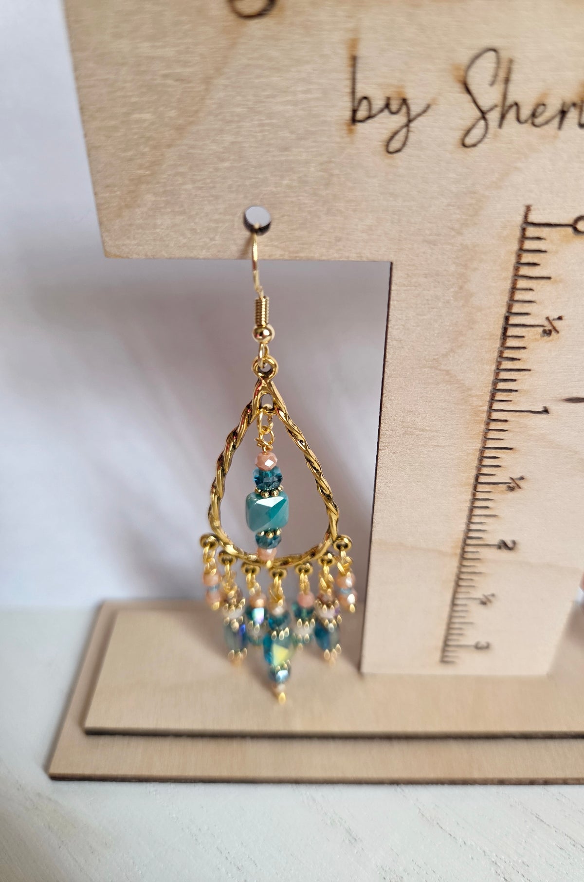 Gold beaded chandelier statement earrings