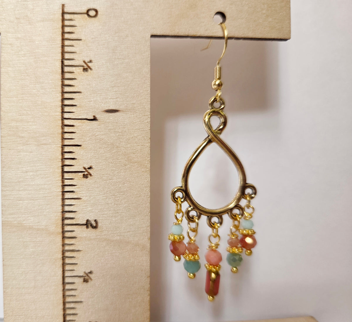 Gold teardrop beaded chandelier statement earrings